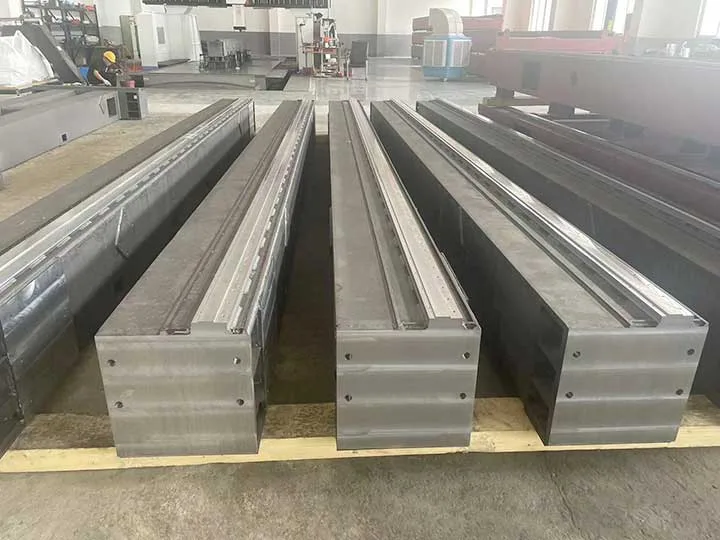 Large precision welded components for ground rails